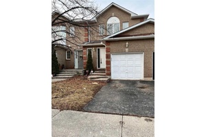 This Bright And Cozy Two Storey, Three Bedroom Townhome Is Located In The Sought After Neighbourhood Of West Oak Trails.