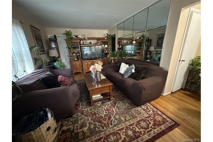 Living area with wood finished floors