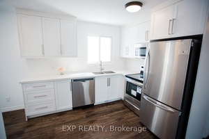Newly renovated, upper floor unit of a LEGAL duplex.