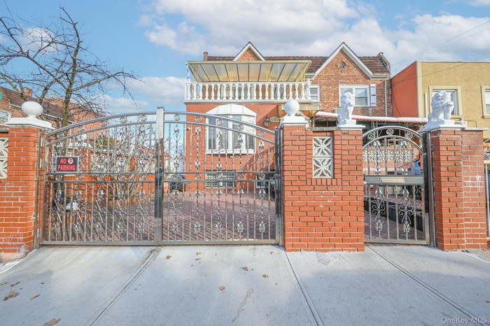 View of gate featuring fence