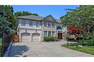 Custom Built Home On Rarely Available 80X145 Ft Private Treed Lot.