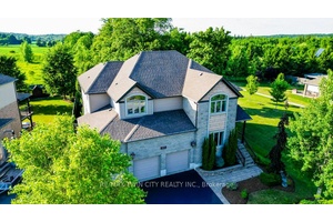 Exquisite custom built home set on a quarter acre lot, offering nearly 5, 000 sq ft of luxurious living space, including a fully finished walkout basement.