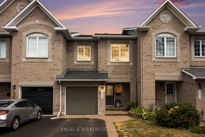 Welcome to 2047 Dorima Street, a beautifully refreshed Minto Empire townhome tucked away on a quiet cul de sac.