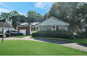 This 3 bedroom 2 bath Ranch is sitting pretty on a tree lined street just waiting for your personal touch.