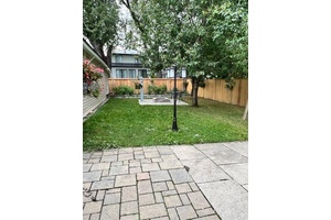 Enjoy the Nicely fenced Oasis Backyard Rare find with basement apartment.