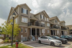 Welcome To This Bright amp ; Stunning 3 Bedroom amp ; 2 Washroom Stacked Condo Townhouse By The Lake.