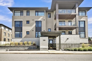 This stylish 2 bedroom den, 2 bath condo is ideally located just steps from Kanata Centrum Shopping Centre.