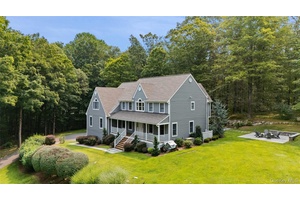 Tucked away on a peaceful cul de sac, a long, tree lined driveway sets the tone as you approach this 4 bedroom, 3.