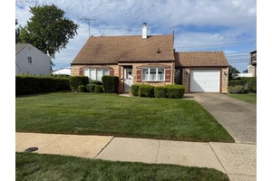 Welcome to 17 Club Lane, a Levitt home offering 3 bedrooms, 1 full bath, EIK and a 1 car garage with breezeway.