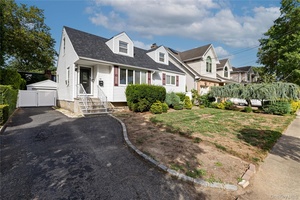 Welcome to this mid block, cozy cape style home in the heart of Malverne Village.