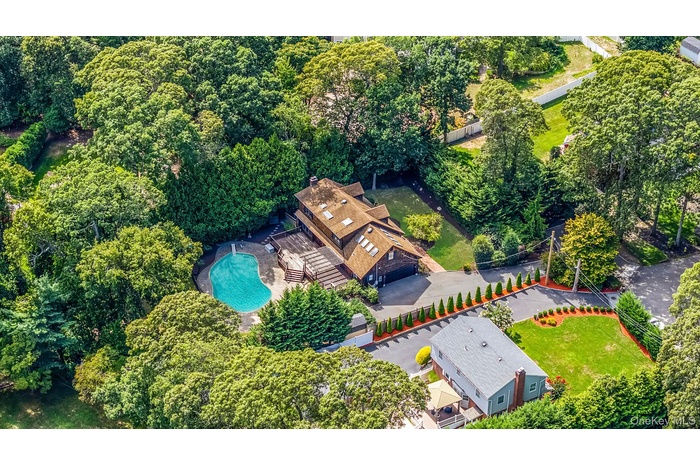 View from above of property featuring a pool