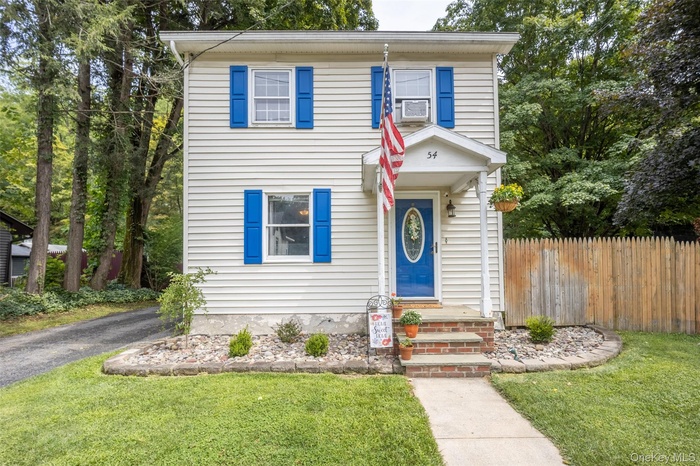 View of front of property with driveway
