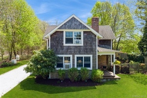 Discover this beautifully restored 4 bedroom, 2 bath farmhouse situated on highly desirable Oregon Road in the heart of North Fork wine country.