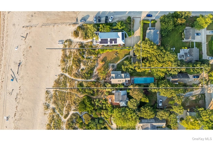 Aerial perspective of suburban area with property boundaries highlighted