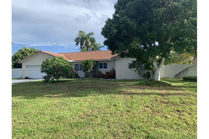 Large home on large lot. Situated on cul-de-sac . Fenced all around for privacy. Lots of parking space.