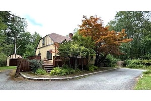 Classic Tudor Home Magnificent features in this home.