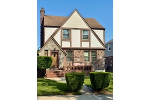 Spacious Tudor Style Home on Wide lined Street in Cambria Heights !