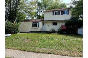 Large expanded ranch with 5 bedrooms, 3.