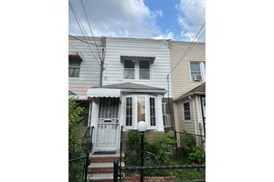A cozy fully renovated 1 Family with finished basement, 1st Floor Living Room, Dining Room.