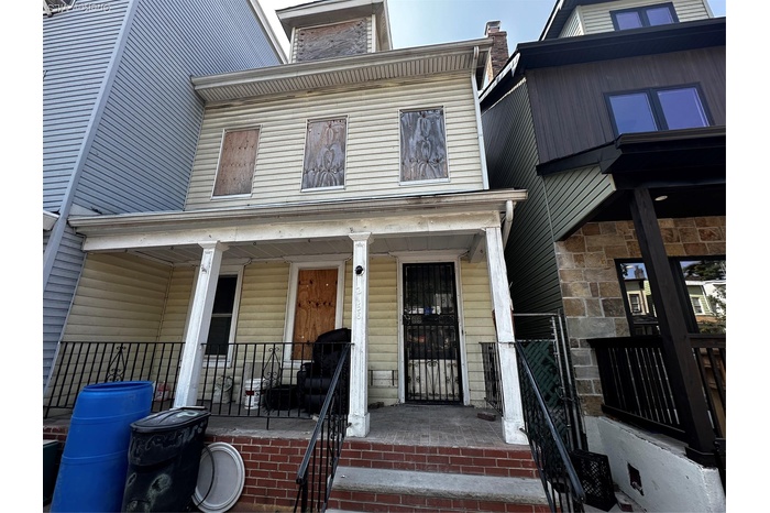 Entrance to property with covered porch