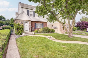 This beautifully maintained home is currently used as a one family residence, but comes with a legal two family C of O, offering flexibility for future use or investment potential.