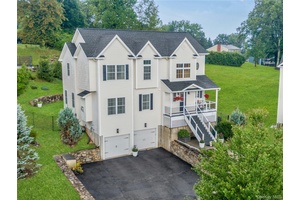 THE RIDGE TOP RETREAT At the end of a picture perfect cul de sac in the sought after Ridge Top Estates, located just under an hour from New York City, ...