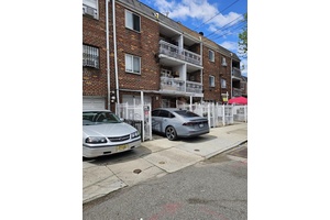 A multi family of three can live and collect rent for two units.