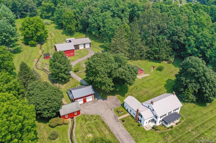 View from above of property featuring a forest
