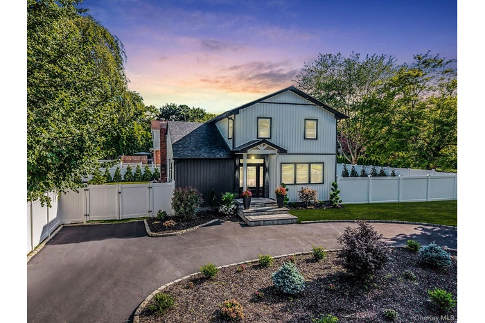 Modern farmhouse with a gate