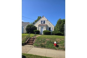 Welcome to this lovely 4 bedroom, 2 bath beautiful cape cod style corner property.