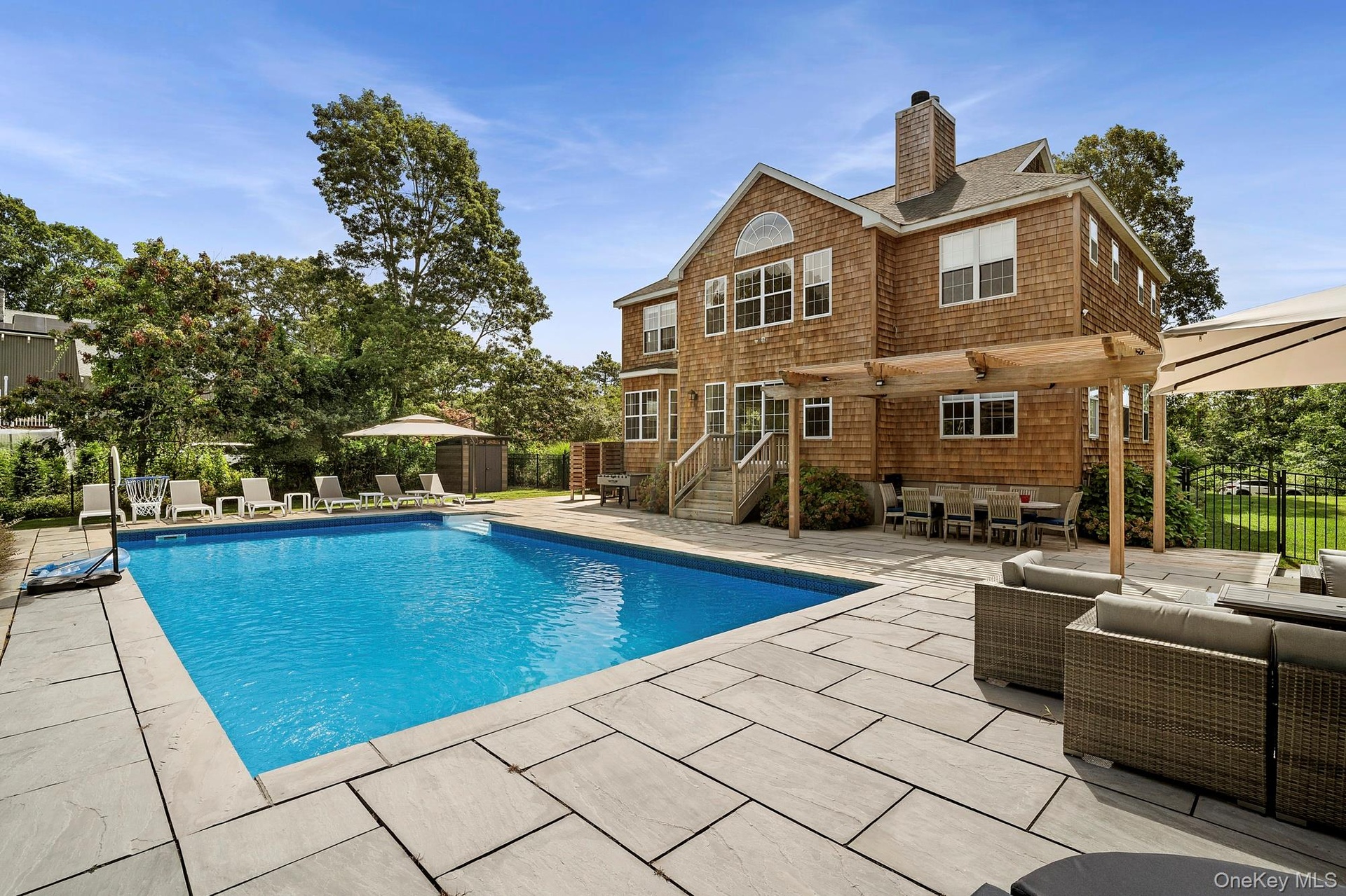 View of pool featuring outdoor lounge area, a patio, and outdoor dining space