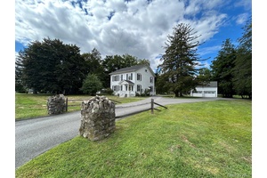 Welcome to this stately 1800's Colonial style home offering a huge amount of space on 1.