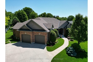 Welcome to this exquisite custom built property, located on the highly sought after Carriage Lane of Bayfield.