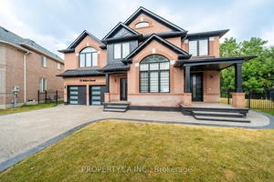 Beautiful large brick detached home on a quiet premium lot in The Vales of Castlemore.