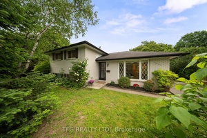 Charming side split on a spacious lot in the heart of Midland !