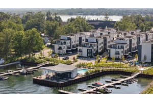 Welcome to 8 Bru Lor Lane, Orillia's most prestigious lakefront community Mariners Pier, where elegance, tranquility, and modern sophistication converge.
