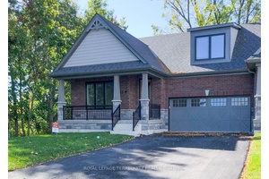 Top two floors of this Beautiful Executive Bungaloft End Unit Townhouse in the highly desirable Cobourg neighbourhood.