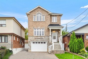 Stunning Custom Designed Home Located In Highly Sought After Neighbourhood !