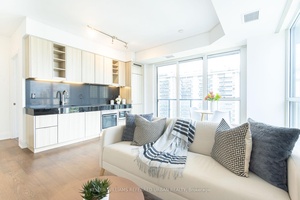 HEART OF Midtown Toronto Yonge Eglinton Luxury 2Br 9' Ceilings Open Concept, Floor to Ceiling windows, Corner unit, LED Lighting strips, Ambient lighting Trendy Designer Laminate Track lighting Kitchen Designer ...