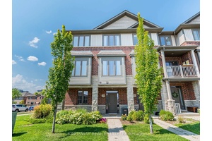Step into this sun filled East Waterdown townhome, where comfort meets convenience.
