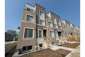 Be proud to call this stunning end unit townhome at M2 Towns by Menkes your home.