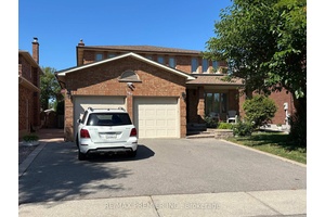 Stunning 4 Bedroom Home With In Law Suite Potential In a Prime Woodbridge Location !