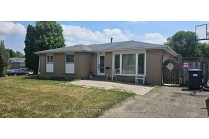 All Brick Detached Bungalow On Premium Corner Lot.