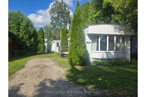 This 2 bedroom, 1 bathroom mobile home offers a great opportunity for anyone looking to put in some work and make it their own.