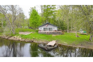 TWO SEPARATELY DEEDED WATERFRONT LOTS !