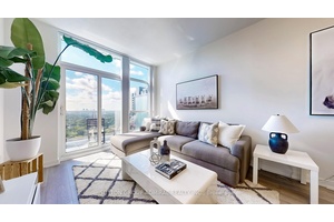 Penthouse Living with Breath taking west views of sunsets in this Top Developer Tridel Built 1 Den Bedroom Home with Balcony.