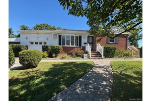 This 3 level, large home with full basement has Enormous Potential.