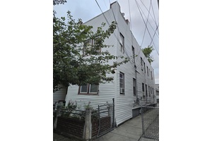 Semi attached 2 family home located in the heart of Richmond Hill.