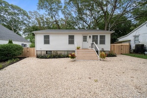 This stunning ranch style home has been fully renovated inside and out.