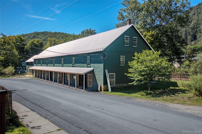 Nestled in the heart of Wassaic Hamlet on Main Street, this meticulously revitalized 1920s two-story barn, spanning 10,640 SF, stands as a testament t